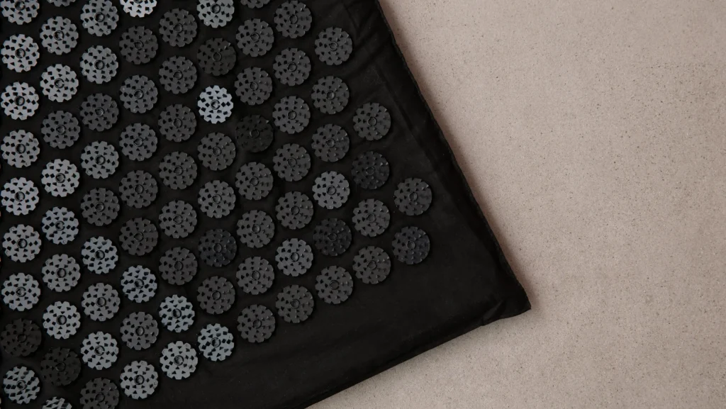 tapis acupression champ de fleurs